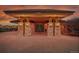 Evening shot of a community clubhouse with stone columns at 23317 E Saratoga Cir, Aurora, CO 80016