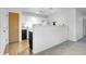 Open kitchen featuring stylish black and white cabinets with modern appliances at 23317 E Saratoga Cir, Aurora, CO 80016