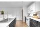 This kitchen features bright white countertops and modern appliances at 23317 E Saratoga Cir, Aurora, CO 80016