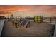 Outdoor fitness park with varied workout equipment and running track at 23317 E Saratoga Cir, Aurora, CO 80016