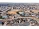 Aerial view of neighborhood featuring community recreation area with a pool and tennis courts at 4334 Lisbon St, Denver, CO 80249