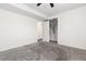 A neutral bedroom with a ceiling fan at 4334 Lisbon St, Denver, CO 80249