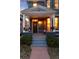 Inviting covered front porch featuring detailed woodwork, decorative columns, and charming exterior design at 713 S Washington St, Denver, CO 80209