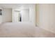 Finished basement with neutral carpet, ample space, and good lighting at 14231 E Dickinson Dr # E, Aurora, CO 80014
