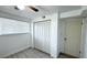 Bright bedroom with double-door closet and laminate flooring at 2683 S Carson Way, Aurora, CO 80014