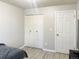 Bedroom with double door closet and neutral walls at 2683 S Carson Way, Aurora, CO 80014