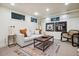 Finished basement featuring a comfortable seating area, recessed lighting, and decorative wall art at 536 N Williams St, Denver, CO 80218