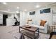 Finished basement featuring a cozy seating area, recessed lighting, and a workout space at 536 N Williams St, Denver, CO 80218