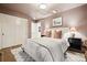 Comfortable bedroom with ample closet space, neutral colors, a large window, and plush carpeting at 536 N Williams St, Denver, CO 80218