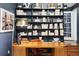 Home office featuring a stylish desk, modern shelving, and curated décor at 536 N Williams St, Denver, CO 80218