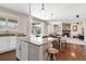 Open concept kitchen with granite countertops, stainless steel appliances and views to the living room at 3323 Starry Night Loop, Castle Rock, CO 80109