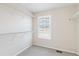 Walk-in closet with carpeted floor, white walls, and installed shelving at 3323 Starry Night Loop, Castle Rock, CO 80109