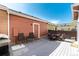 Relax in the spacious back deck with outdoor seating perfect for entertaining Gathering and friends at 22725 E Ottawa Pl, Aurora, CO 80016