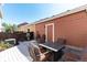 Cozy back deck offers ample seating and space perfect for an outdoor fire or grilling at 22725 E Ottawa Pl, Aurora, CO 80016