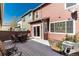 A spacious back deck with outdoor seating offers a great space to relax in this townhome at 22725 E Ottawa Pl, Aurora, CO 80016