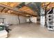 Spacious unfinished basement with concrete walls and floors at 22725 E Ottawa Pl, Aurora, CO 80016