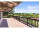 A spacious wooden deck with scenic views is ideal for outdoor entertaining at 4 Greenridge Rd, Greenwood Village, CO 80111