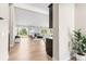 Bright open living space with a modern fireplace and sliding glass doors to the patio at 4 Greenridge Rd, Greenwood Village, CO 80111