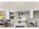 Stylish living area with modern furnishings and an open layout to the kitchen at 4 Greenridge Rd, Greenwood Village, CO 80111