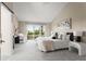 Serene main bedroom with a vaulted ceiling, private balcony, and neutral decor at 4 Greenridge Rd, Greenwood Village, CO 80111