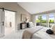 Serene main bedroom with a private balcony and an ensuite bathroom at 4 Greenridge Rd, Greenwood Village, CO 80111