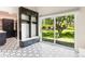 Stylish mudroom with built-in storage, bench, and geometric tile flooring at 4 Greenridge Rd, Greenwood Village, CO 80111