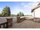 Stunning patio area with stone pavers and mountain views for relaxing and entertaining at 18844 Ute Vista Trl, Morrison, CO 80465