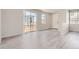 Bright and airy living room with sliding glass doors offering seamless indoor-outdoor living at 14109 Deertrack Ln, Parker, CO 80134