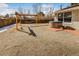 Backyard featuring a hot tub and hammock, perfect for relaxing outdoors at 951 S Fulton St, Aurora, CO 80247