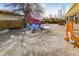 Spacious backyard with lounge chairs, hot tub, and room for entertaining at 951 S Fulton St, Aurora, CO 80247