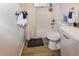 Clean bathroom featuring a shower, toilet, and sink with modern fixtures, creating a functional space at 951 S Fulton St, Aurora, CO 80247