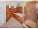 Bathroom featuring both a standalone shower and a bathtub, and natural light at 951 S Fulton St, Aurora, CO 80247