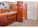 Bathroom with marble countertops, and custom built-in storage at 951 S Fulton St, Aurora, CO 80247