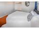 Comfortable bedroom featuring a large bed and an open closet, offering a serene retreat at 951 S Fulton St, Aurora, CO 80247