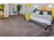 Spacious primary bedroom featuring colorful decor, a cozy desk area, and a relaxing atmosphere at 951 S Fulton St, Aurora, CO 80247
