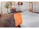 Bedroom featuring a large bed, flatscreen television, and lush outdoor scenery at 951 S Fulton St, Aurora, CO 80247