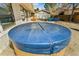 Large outdoor hot tub with privacy fencing and backyard access at 951 S Fulton St, Aurora, CO 80247