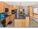 Bright kitchen featuring stainless steel appliances and ample cabinet space at 951 S Fulton St, Aurora, CO 80247