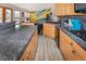 Spacious kitchen with a large countertop and stainless steel appliances at 951 S Fulton St, Aurora, CO 80247