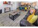 Open-concept living space with kitchen, dining, and living areas at 951 S Fulton St, Aurora, CO 80247