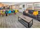 Cozy living room area with a comfortable couch, dining area, and bright kitchen at 951 S Fulton St, Aurora, CO 80247