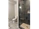 Basement bathroom with toilet and walk-in shower at 229 High Meadows Loop, Elizabeth, CO 80107