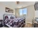 Charming bedroom with rustic decor and large window at 229 High Meadows Loop, Elizabeth, CO 80107