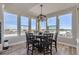 Bright breakfast nook with large windows and seating for six at 229 High Meadows Loop, Elizabeth, CO 80107
