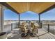 Covered deck with firepit and scenic views at 229 High Meadows Loop, Elizabeth, CO 80107