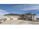 Beautiful ranch home with three-car garage, stone accents, and landscaped entry at 229 High Meadows Loop, Elizabeth, CO 80107