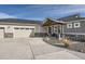Craftsman style home with three-car garage and stone accents at 229 High Meadows Loop, Elizabeth, CO 80107