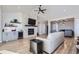 Open living space with a stone fireplace and large windows at 229 High Meadows Loop, Elizabeth, CO 80107