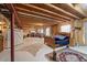 Spacious unfinished basement features exposed beams and some drywall work at 38087 E 147Th Pl, Keenesburg, CO 80643
