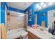 Bathroom with bright blue colors, nice mirror and shower at 38087 E 147Th Pl, Keenesburg, CO 80643